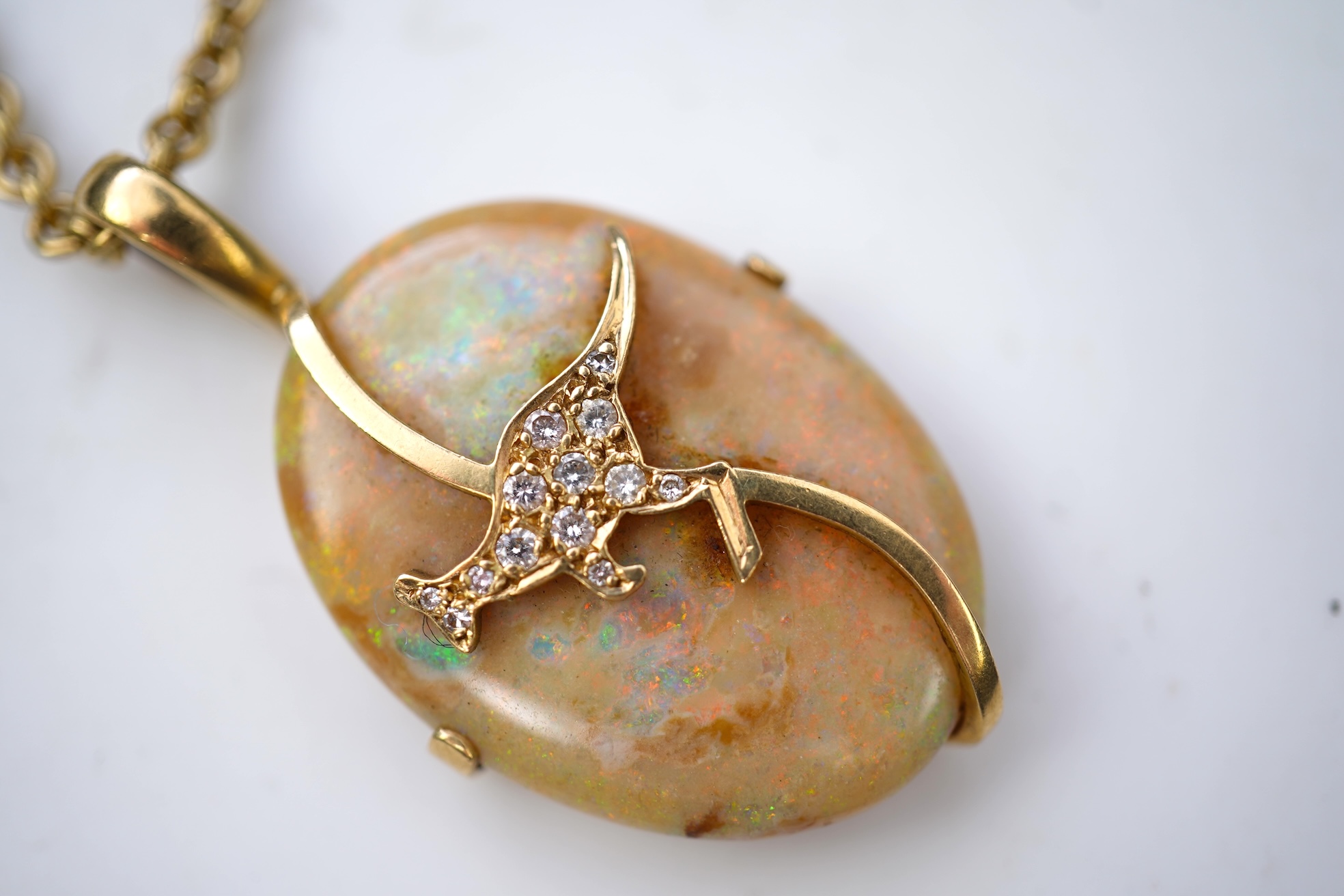 An opal and diamond pendant necklace